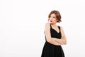 Portrait of an upset girl dressed in black dress Royalty Free Stock Photo