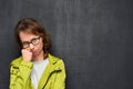 Portrait of upset girl with glasses Royalty Free Stock Photo