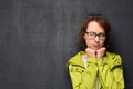 Portrait of upset girl with glasses looking sadly aside Royalty Free Stock Photo