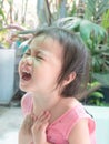 Portrait of upset stress sad unhappy asian crying little toddler girl in age of terrible two