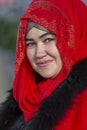 Uzbek woman looking and smiling, Samarkand, Uzbekistan