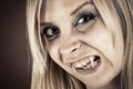Portrait of a vampire with fangs Royalty Free Stock Photo