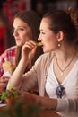 Portrait of vegeratian ladies in cafe Royalty Free Stock Photo