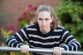 Angry looking young woman , seeks revenge Royalty Free Stock Photo