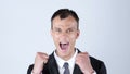 Portrait of a very excited happy young man celebrating success Royalty Free Stock Photo