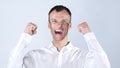 Portrait of a very excited happy young man celebrating success Royalty Free Stock Photo