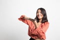 Portrait of very happy  young asian woman throwing out money banknotes Royalty Free Stock Photo