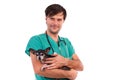Portrait of a veterinarian doctor holding a chihuahua dog