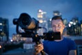 Portrait of videographer with camera and gimbal Royalty Free Stock Photo