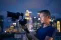 Portrait of videographer with camera and gimbal Royalty Free Stock Photo