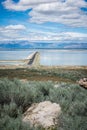 Portrait view of Antelope Island State Park road leading over Bridger Bay in Utah Royalty Free Stock Photo