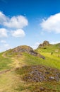 A portrait view of Caer Caradoc and The Lawley Hills in the Shropshire Hills Area of Natural Beauty in Shropshire, UK with Cairns