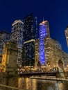 Portrait view of Chicago Loop illuminated at night with blue lights Royalty Free Stock Photo