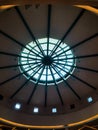 portrait view of circle ceiling roof glasses at Mall