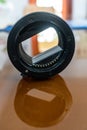 Portrait view of Macro extension tubes on glass background. Two separated extension tubes for macro photography Royalty Free Stock Photo