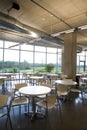 Portrait view offic cafeteria with centered table. Royalty Free Stock Photo