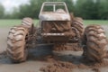 A portrait view of a offroad racing car with mud splattered all over it surrounded by clouds of dirt and gravel. Speed