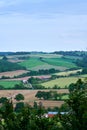 Portrait view over english rolling hills and farm fields in countryside