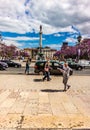 portrait view of rossio square in Lisbon Portugal 20 may 2019. a beautiful view of rossio square with running clouds in the sky