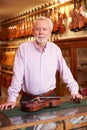 Portrait Of Violin Maker In Shop Royalty Free Stock Photo
