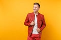 Portrait vogue confident handsome young man 25-30 years in red leather jacket, t-shirt stand isolated on bright trending Royalty Free Stock Photo