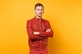 Portrait vogue confident handsome young man 25-30 years in red leather jacket, t-shirt stand isolated on bright trending Royalty Free Stock Photo