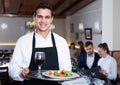 Portrait of waiter in restaurant Royalty Free Stock Photo