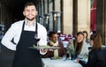 Portrait of waiter in restaurant Royalty Free Stock Photo