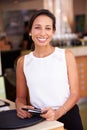 Portrait Of Waitress In Hotel Restaurant Preparing Bill Royalty Free Stock Photo