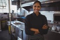 Portrait of waitress standing in cafe Royalty Free Stock Photo