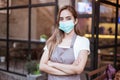 Waitress wearing a face mask at the coffee shop