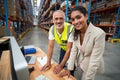 Portrait of warehouse manager and worker working together Royalty Free Stock Photo