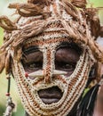 Portrait of a Warrior Asmat tribe in an unusual battle mask.