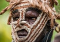 Portrait of a Warrior Asmat tribe in an unusual battle mask.