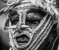 Portrait of a Warrior Asmat tribe in an unusual battle mask.