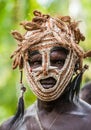 Portrait of a Warrior Asmat tribe in an unusual battle mask.