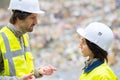 portrait waste site workers talking Royalty Free Stock Photo