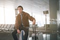 Bored male situating on baggage Royalty Free Stock Photo