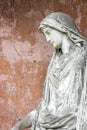 Portrait of a weathered sculpture of maria