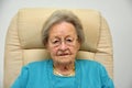Carefully looking ninety years old senior woman Royalty Free Stock Photo
