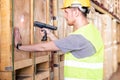 Portrait white caucasian worker with barcode reader  in distribution warehouse Royalty Free Stock Photo