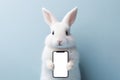 Portrait of a white cute rabbit Happy smiling smart holding a smartphone with white screen mockup. ai generative