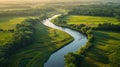portrait of a winding river through cornfields and pastures in the heart of the Midwest
