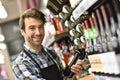 Portrait of wine specialist in wine section working