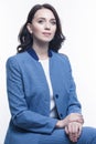 Portrait of Winsome Positive Young Confident Caucasian Business Woman in Blue Checked Suit Posing Over White Background Royalty Free Stock Photo