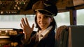 Portrait of woman airline copilot in command to fly airplane