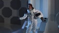 Portrait of a woman astronaut in a space suit on a spaceship