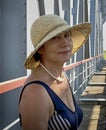Portrait. Woman in a beautiful yellow hat. Royalty Free Stock Photo