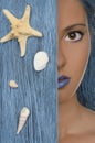 Portrait of woman with blue hair and shells Royalty Free Stock Photo