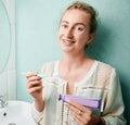 Portrait of woman with braces demonstrating teeth brushing Royalty Free Stock Photo